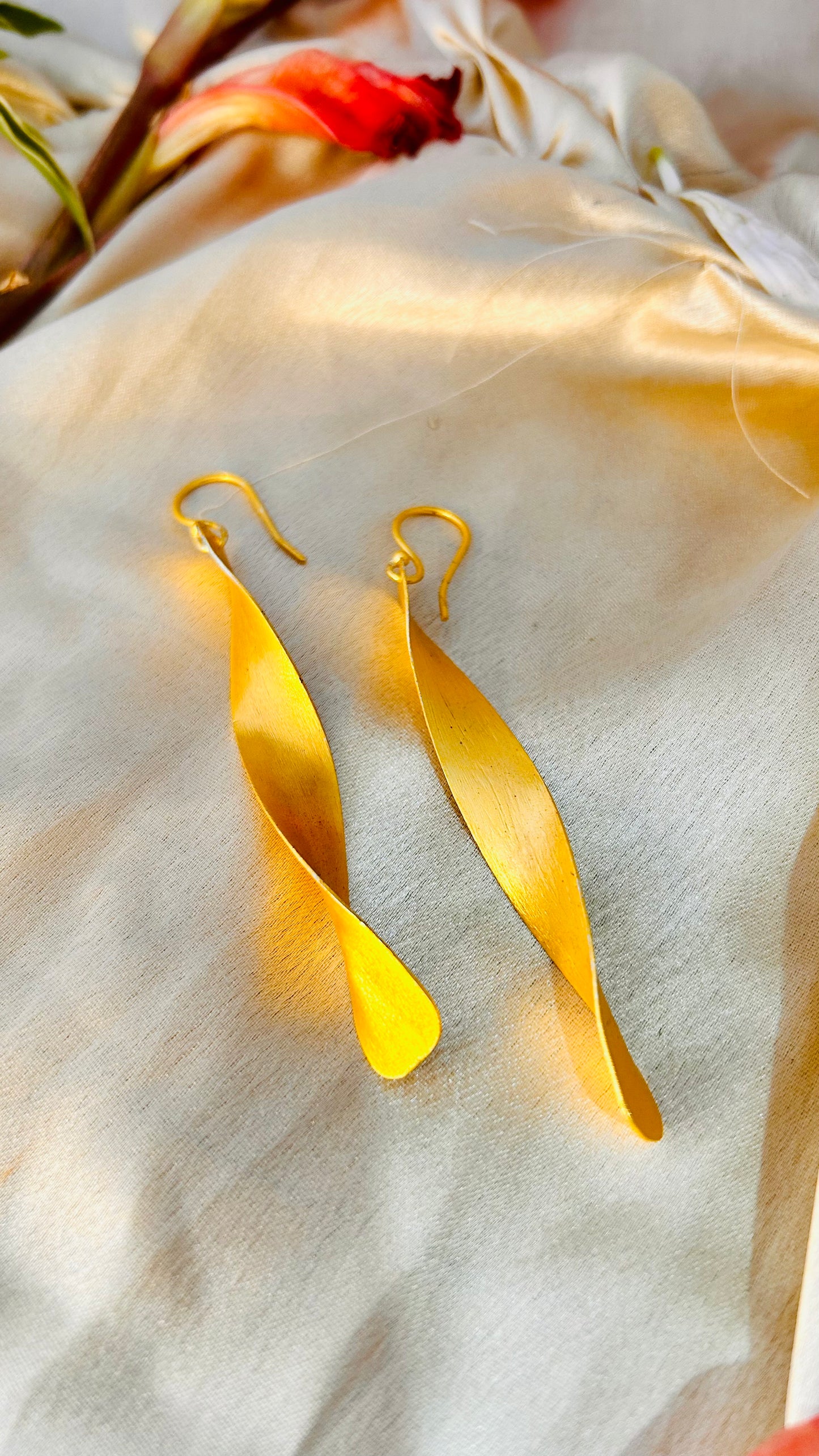 Golden Twirl Dangle Earrings – Jewelshala Bling