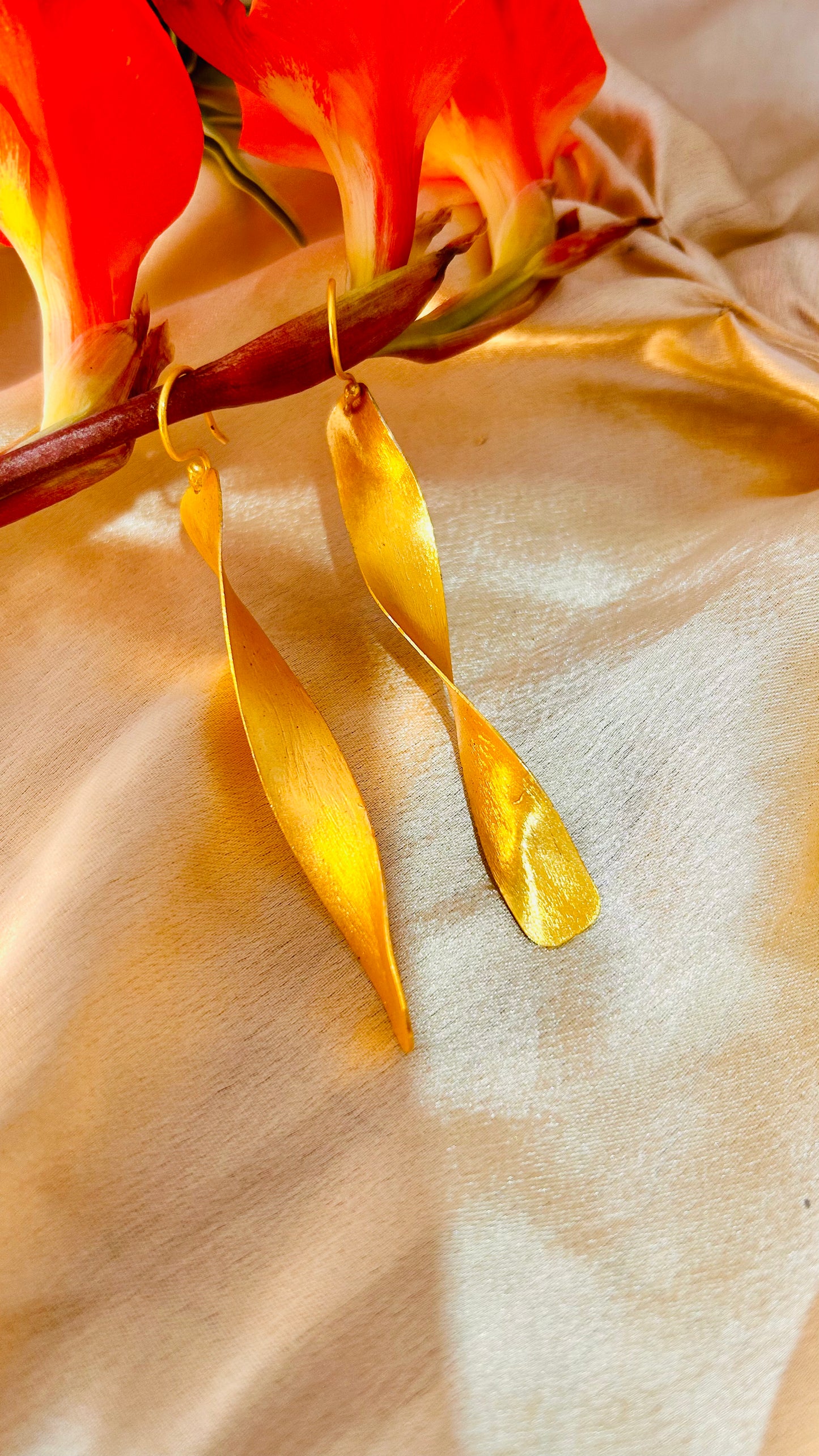 Golden Twirl Dangle Earrings – Jewelshala Bling